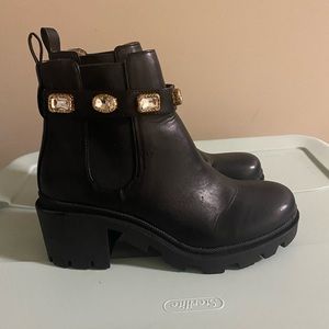 Black Steve Madden booties with gems